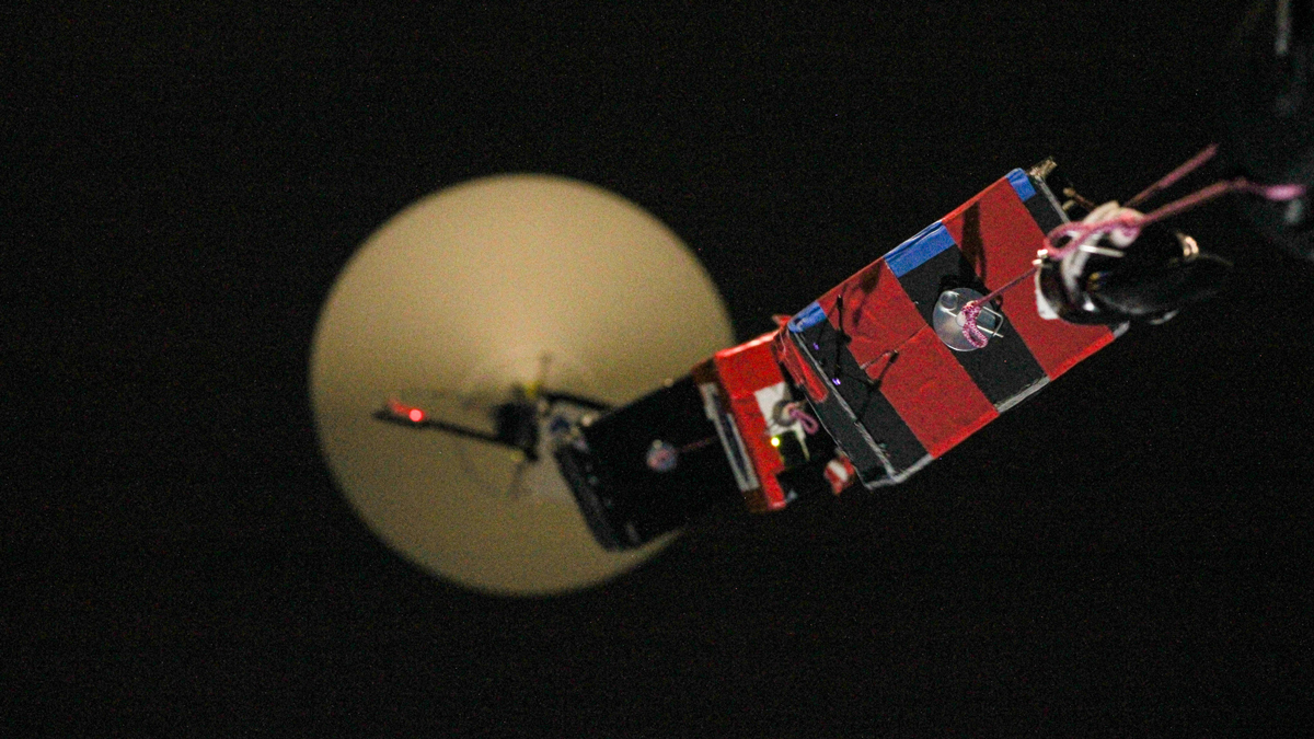 view of the balloon ascending into the darkness